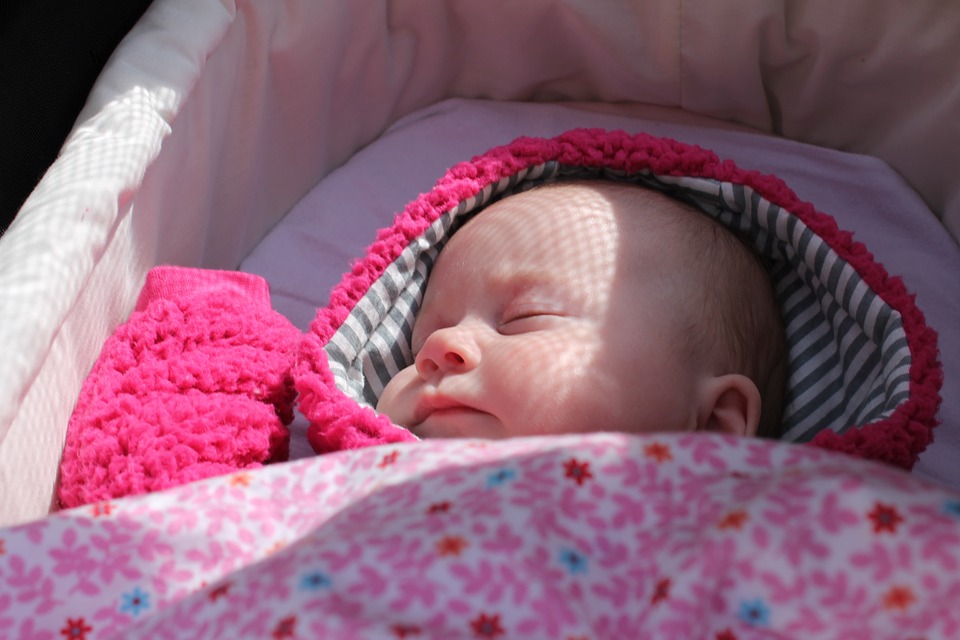 Baby sleeping in a crib