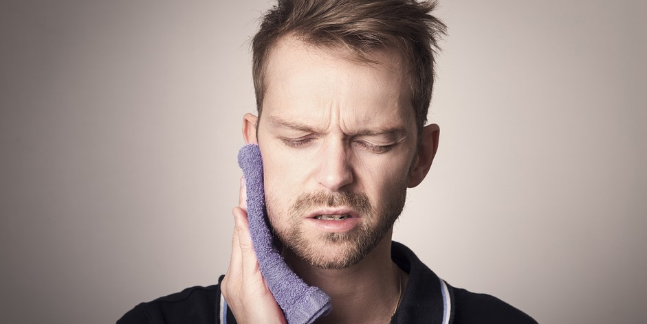 man with tooth ache